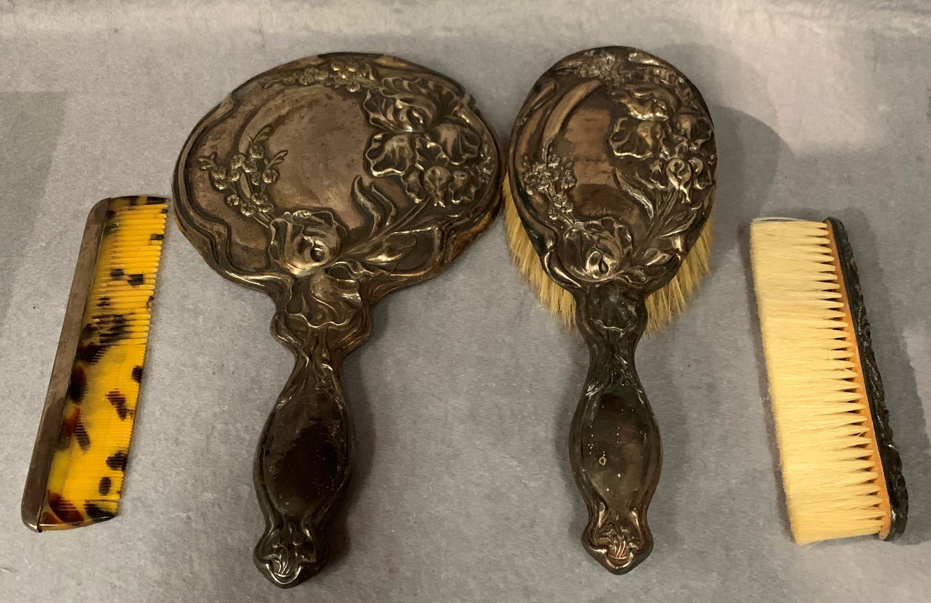 A silver art embossed hand mirror, hairbrush, - Image 2 of 2