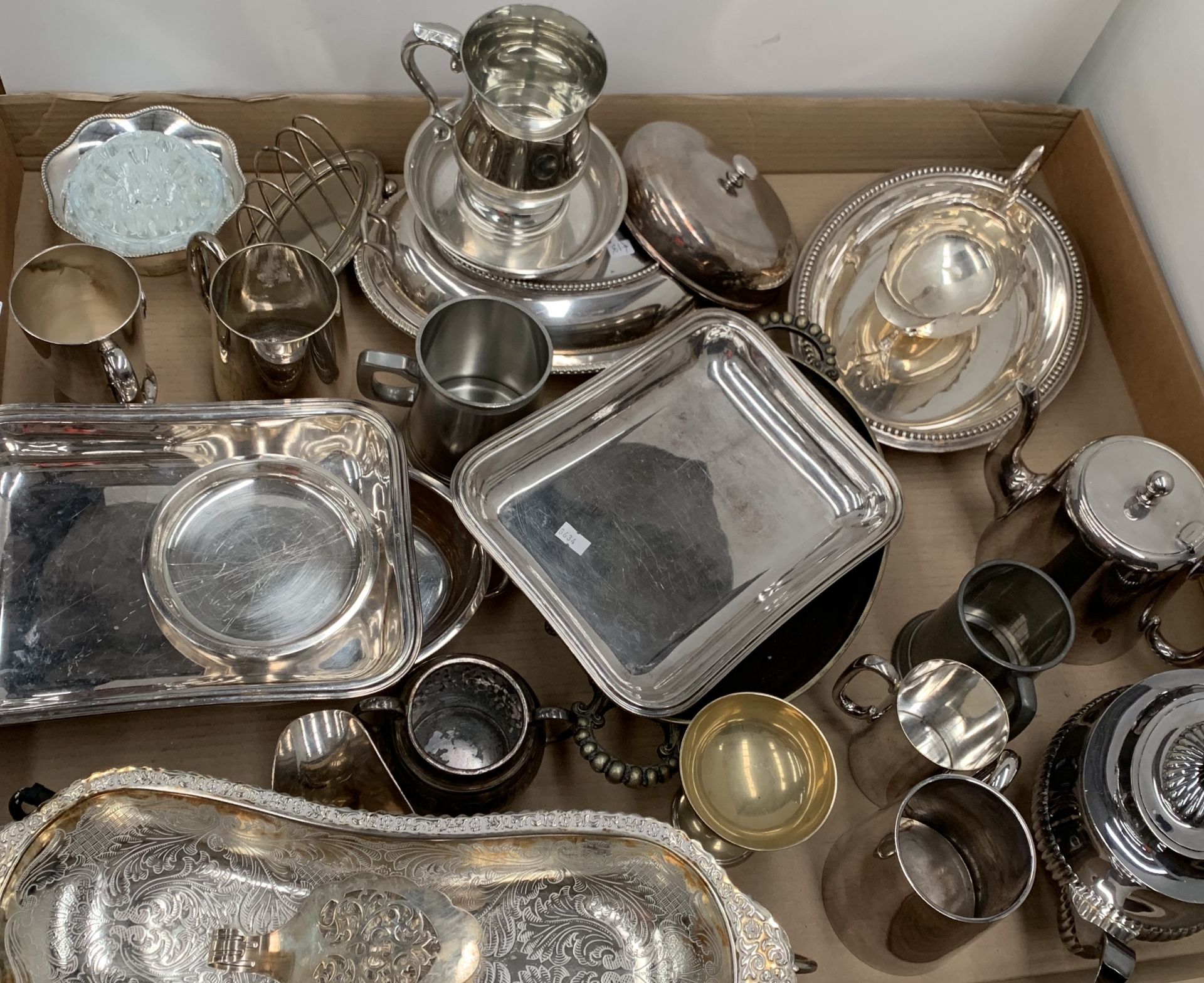 Contents to tray - a quantity of plated ware teapots, trays, dishes, tankards etc.