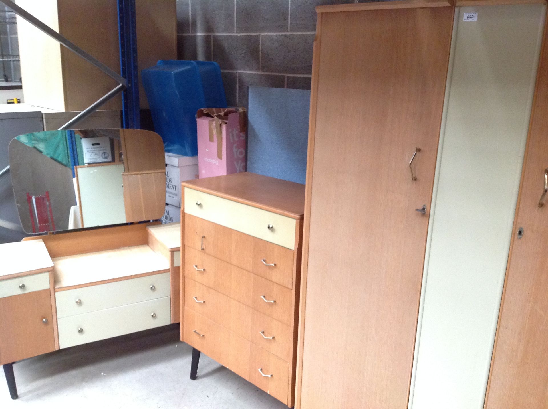 A Remploy teak double door wardrobe 90 x 174cm high and a matching four drawer chest of drawers,