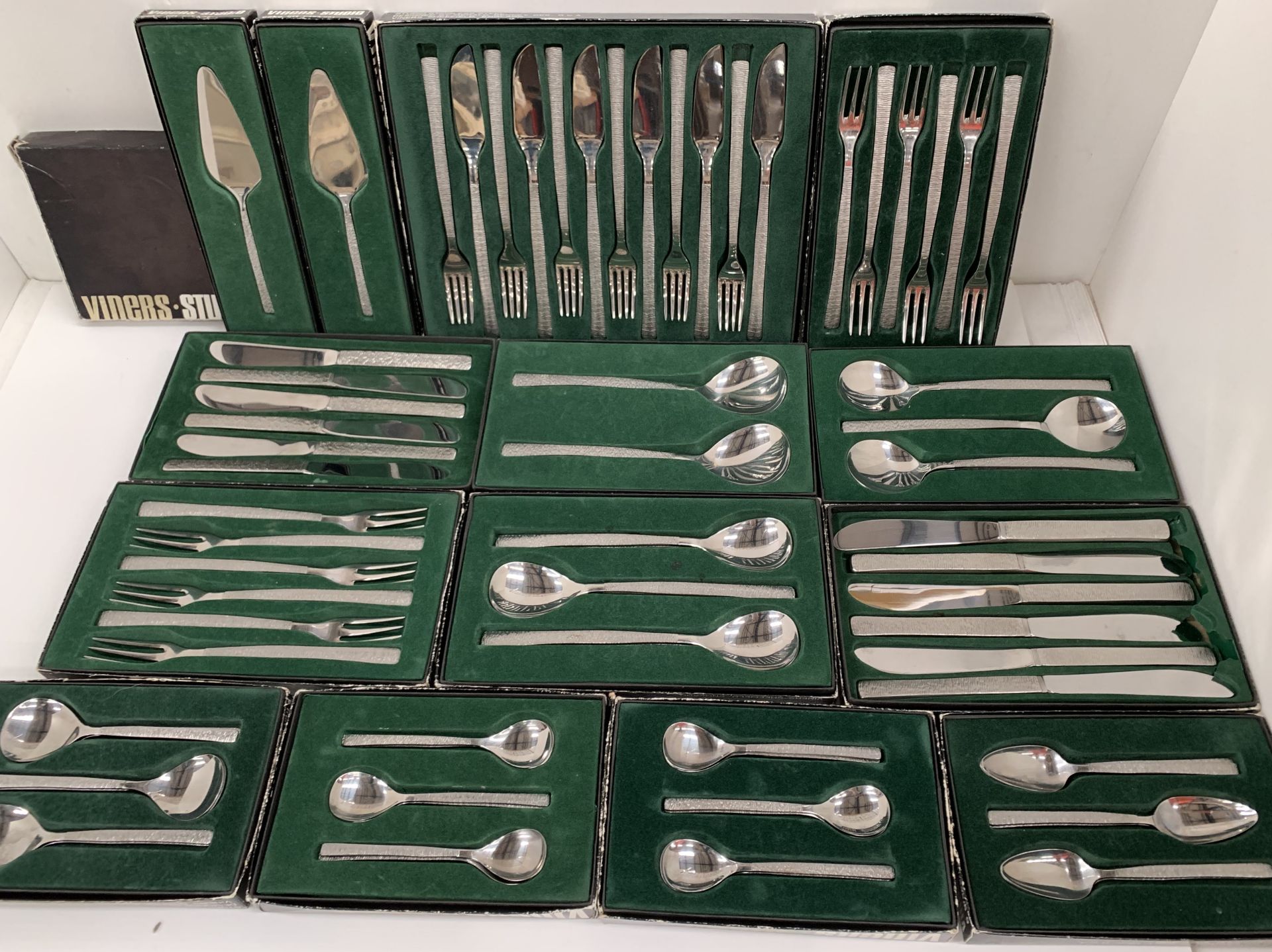 14 x boxed sets and individual pieces of Viners Studio stainless steel cutlery designed by Gerald