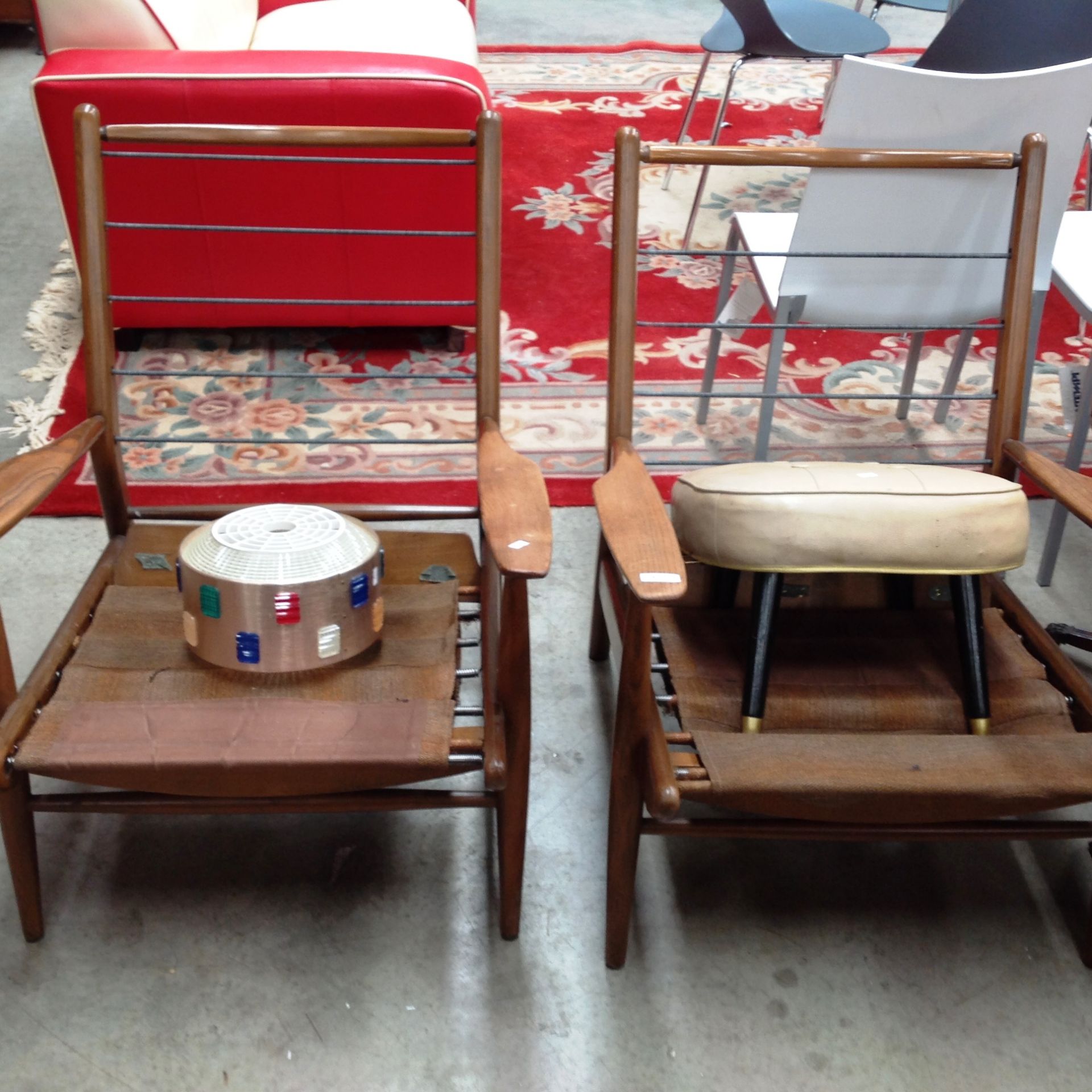 A pair of oak framed 1960s armchairs (upholstery removed),