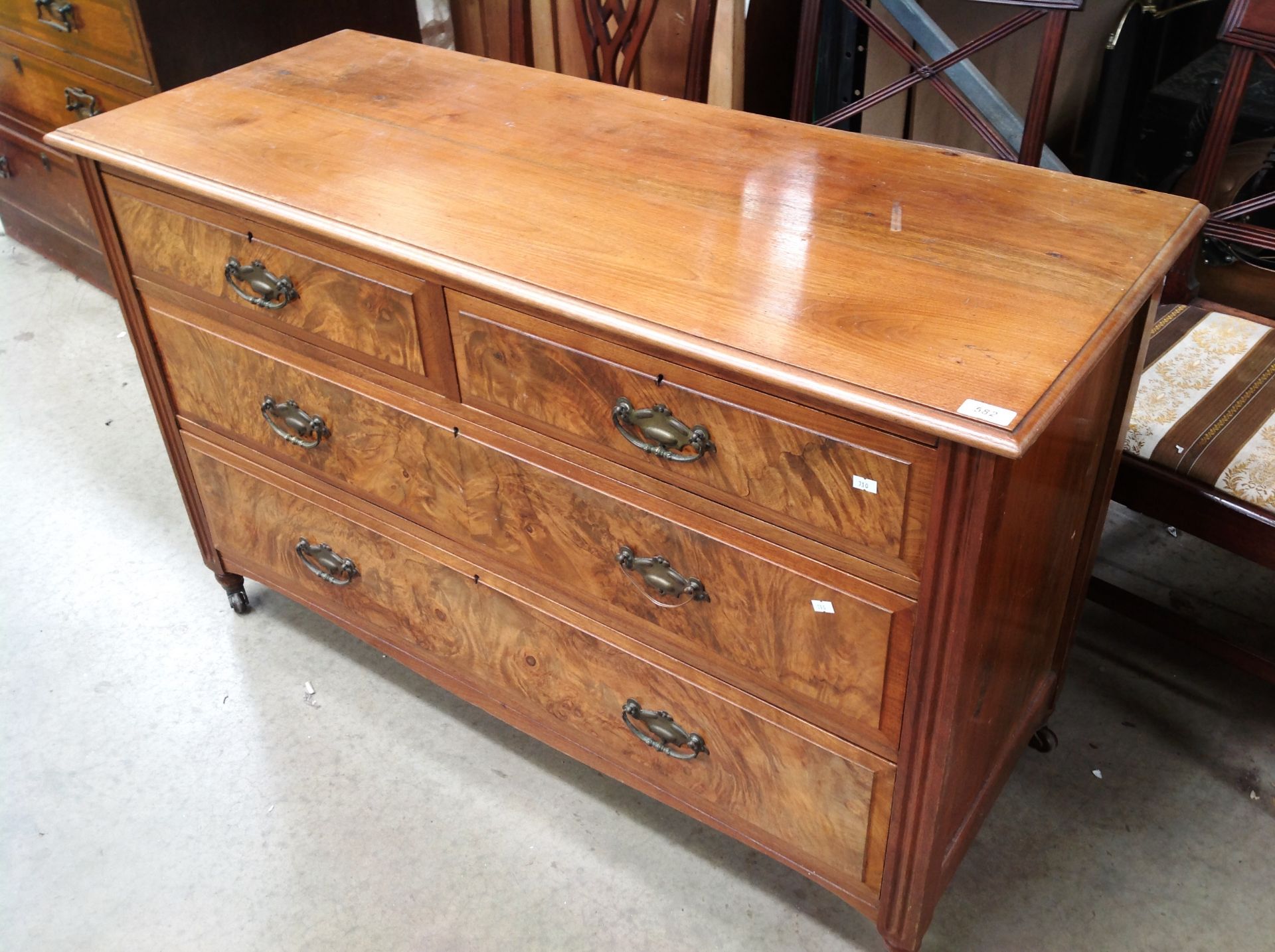 A walnut four drawer (two short,