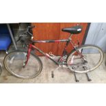 A Raleigh Mustang 5i5 all terrain 15 speed mountain bike