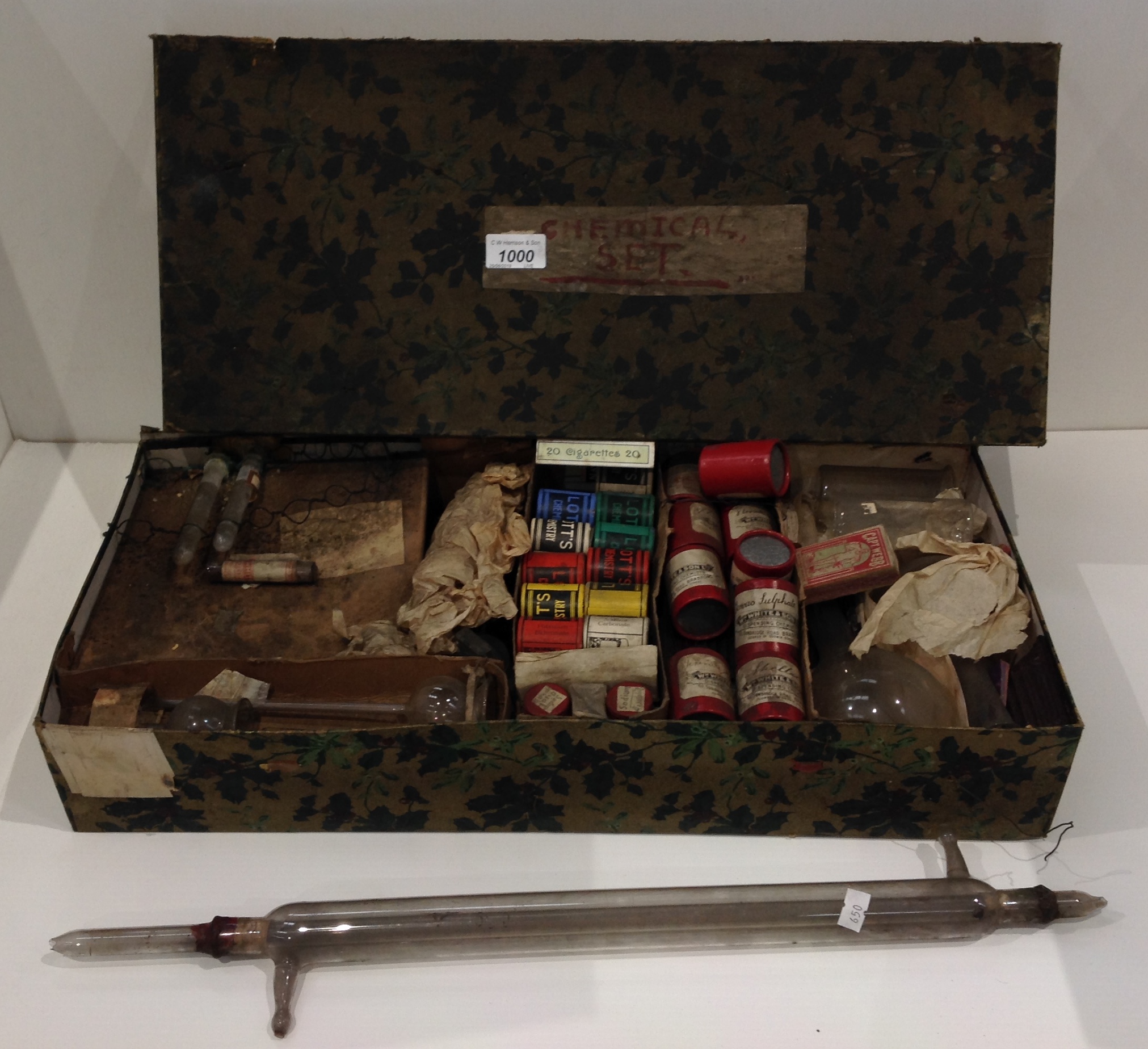 A vintage chemical set - as viewed with Lotts & Whites & Son chemists tins and contents,