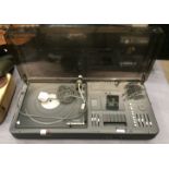 A Bush Arena audio system 1500 home entertainment system with a built in Garrard turntable - no