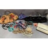 Contents to drawer - three evening bags and quantity of costume jewellery,