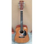 A Hondo H125A acoustic guitar