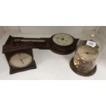 Two mantel clocks and a barometer