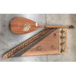 Two items - Oriental sitar instrument and a harp string instrument