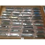 Contents to tray - 40 x N 1:160 scale miniature model trains - all packaged