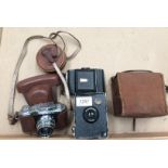 Three items - Halina 35X camera in case,