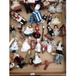 Contents to tray - a quantity of pottery miniature dolls in a variety of costumes relating to