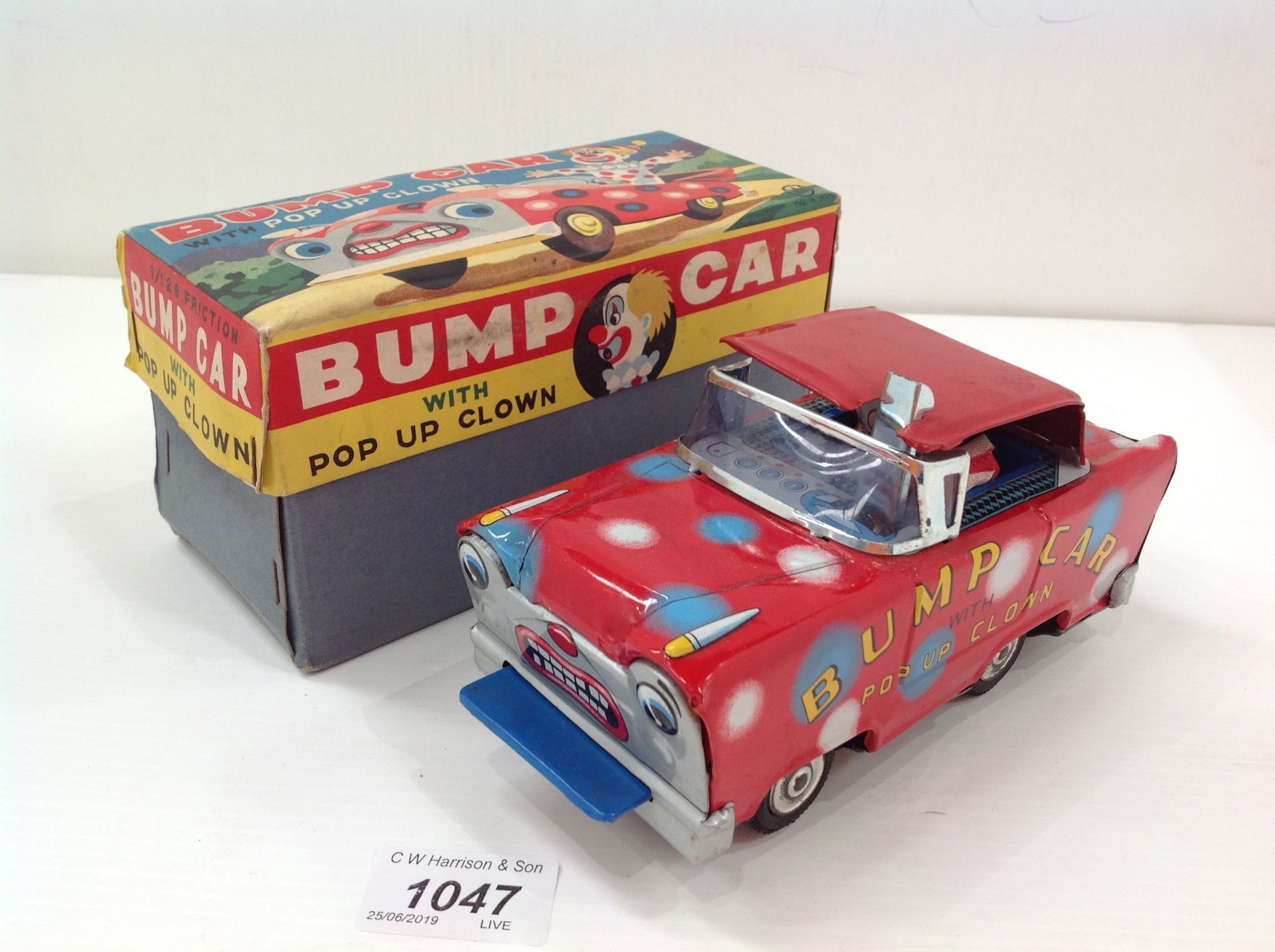 A Wakasuto Toys Japan bump car with pop up clown (boxed) - Image 2 of 2