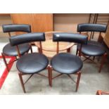 A set of four G Plan teak framed dining chairs, possibly IB Kofod Larsen,