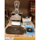 An Avery 1102 shop weighing scales complete with weights,