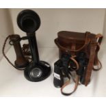 Two items - a pair of Aquilus 10 x 35 binoculars in case and a candlestick telephone