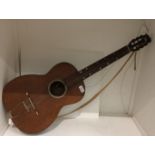 A Francesco Perretti & Figli acoustic guitar complete with travel bag