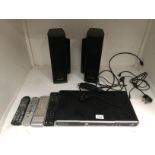 A Sagemcom digital TV recorder - remote control and a pair of Toshiba surround sound speakers