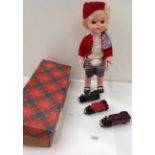 An Anthole Product plastic doll 42cm long in traditional Scottish dress (boxed) and three model