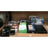 Contents to tray - Black & Decker handheld vacuum cleaner, Panasonic DVD player, Binatone,