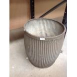 A galvanised peggy tub