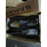 A pair of Parkers black safety boots size 6