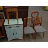 A small kitchen utility cabinet 60cm, a stool with lift top and quantity of sewing accessories,