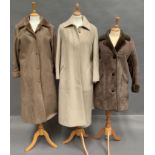 Two ladies leather/suede jackets and a full length ladies coat by Marks and Spencer,