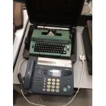 Two items - Smith-Corona C400 electric typewriter in case and a Sanyo SFX-210 fax machine
