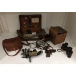 Astro MKII compass, Jloca Prontor camera in leather case, Goerz binoculars, toy pistol,