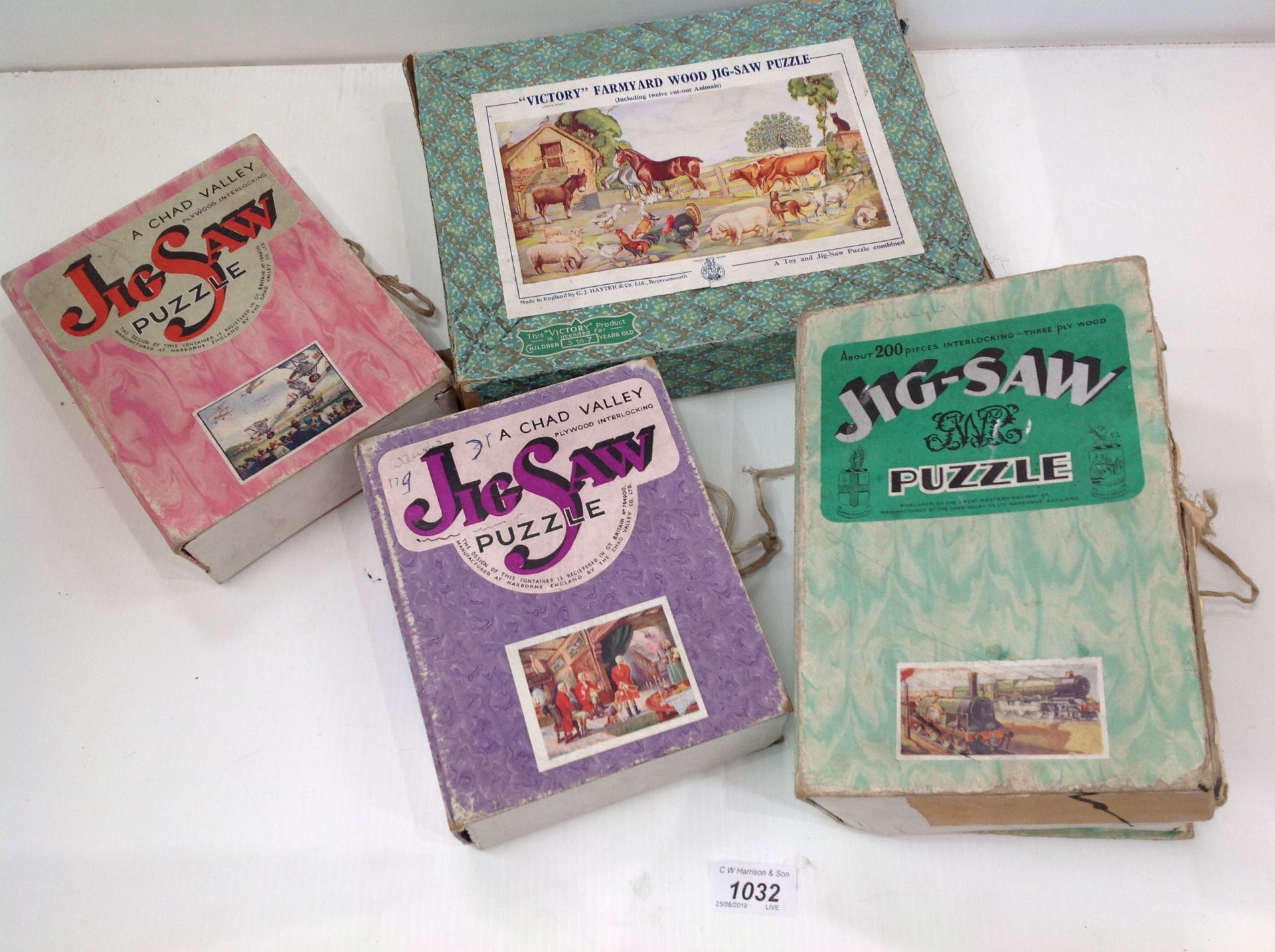 Four boxed wooden jigsaw puzzles - three by Chad Valley, one by G. J. Hayter & Co.