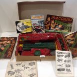 A Meccano set as viewed complete with a quantity of Meccano magazines,