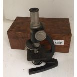 Milbro microscope in wooden case