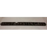 A cast metal sign "Shut & Fasten Gate"