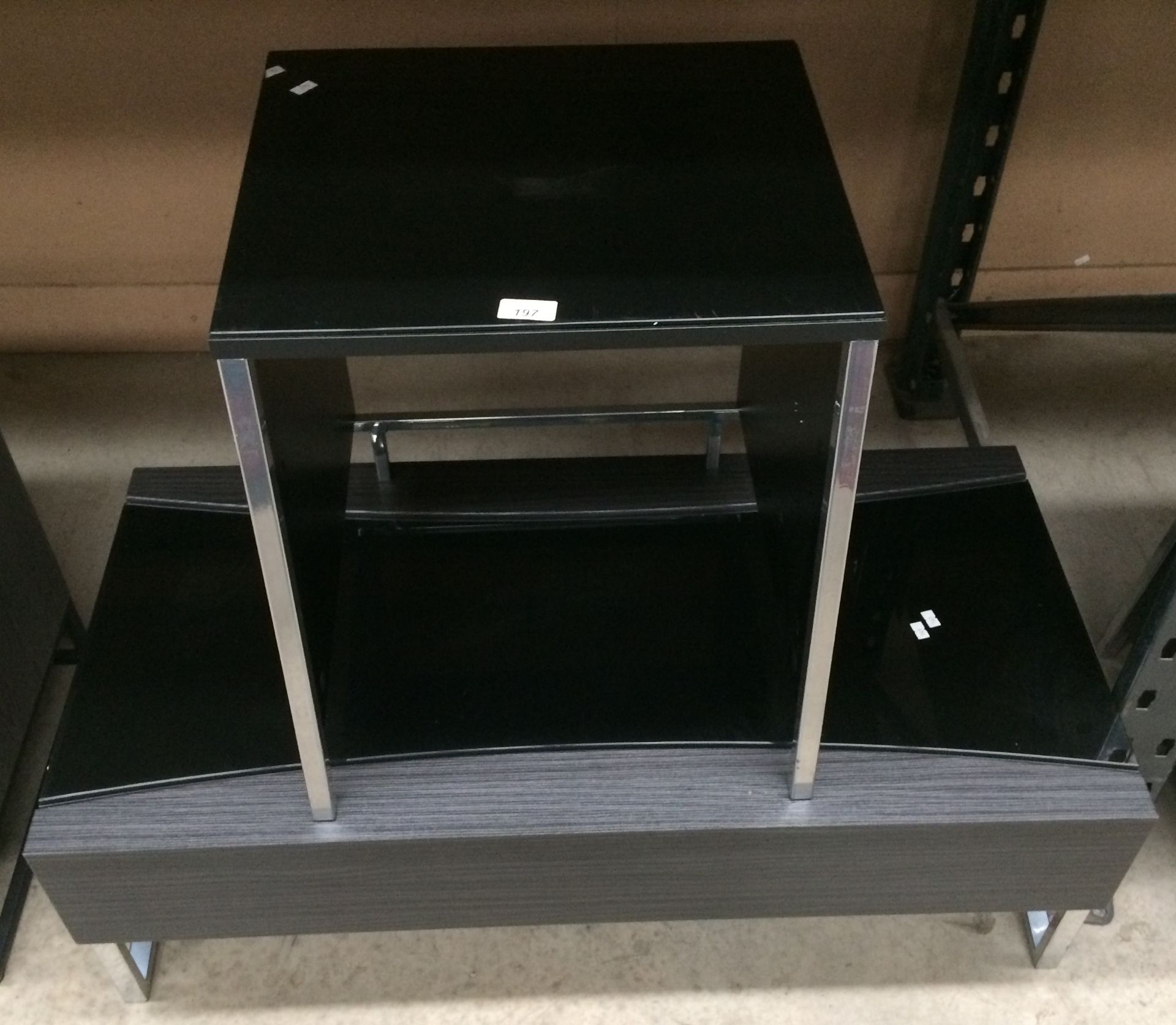 Two items - black entertainment stand 50 x 100cm on chrome legs and a black glass top side table on