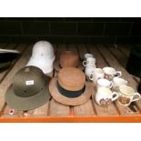 13 x items - pith helmet, white soldier's helmet, 2 x straw hats,