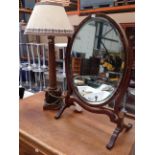 An oval swing toilet mirror and an oak table lamp (2)