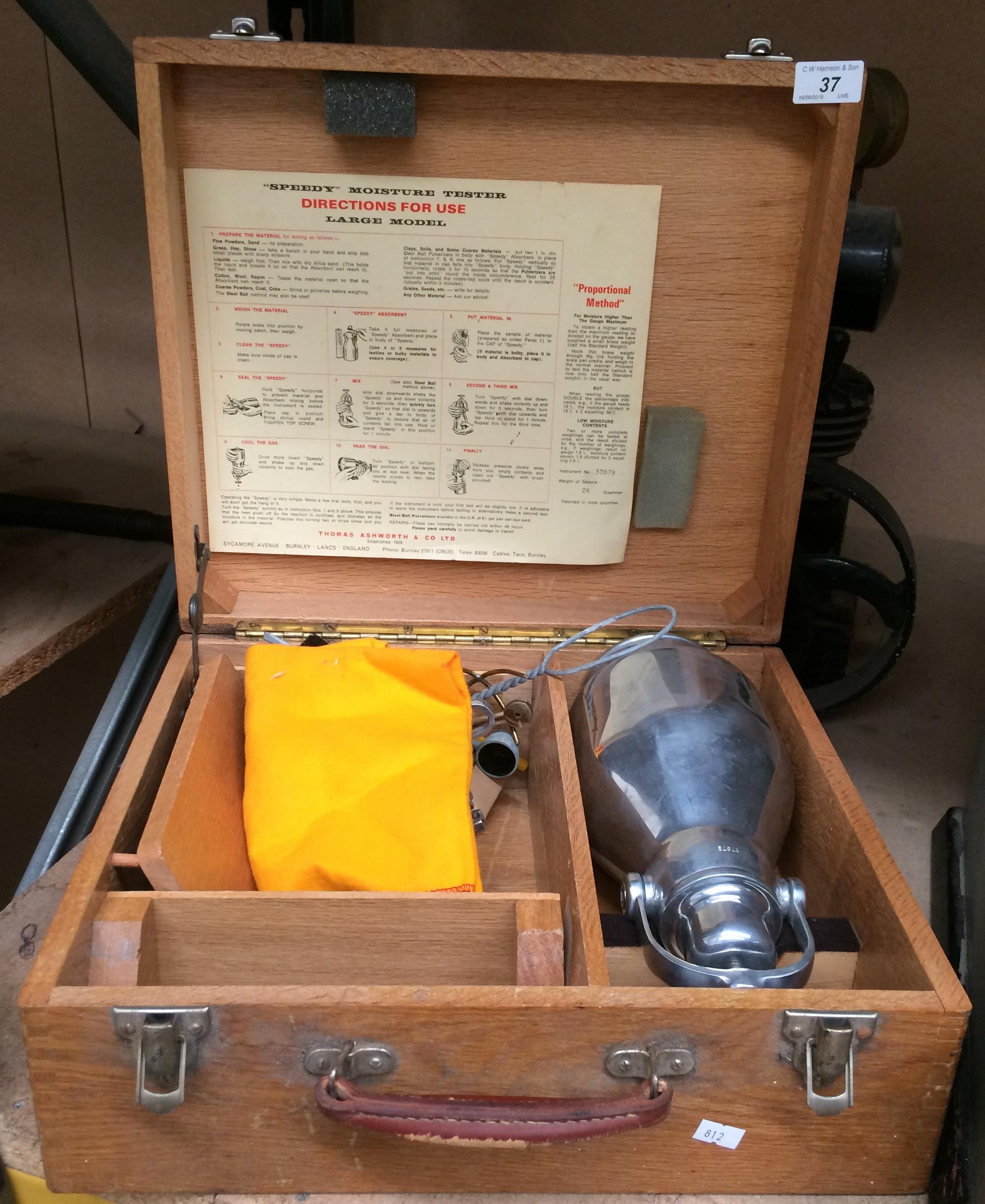 A "Speedy" moisture tester in wooden case