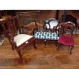 A reproduction mahogany Chippendale style dolls chair,