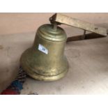 A brass bell - 20cm high,