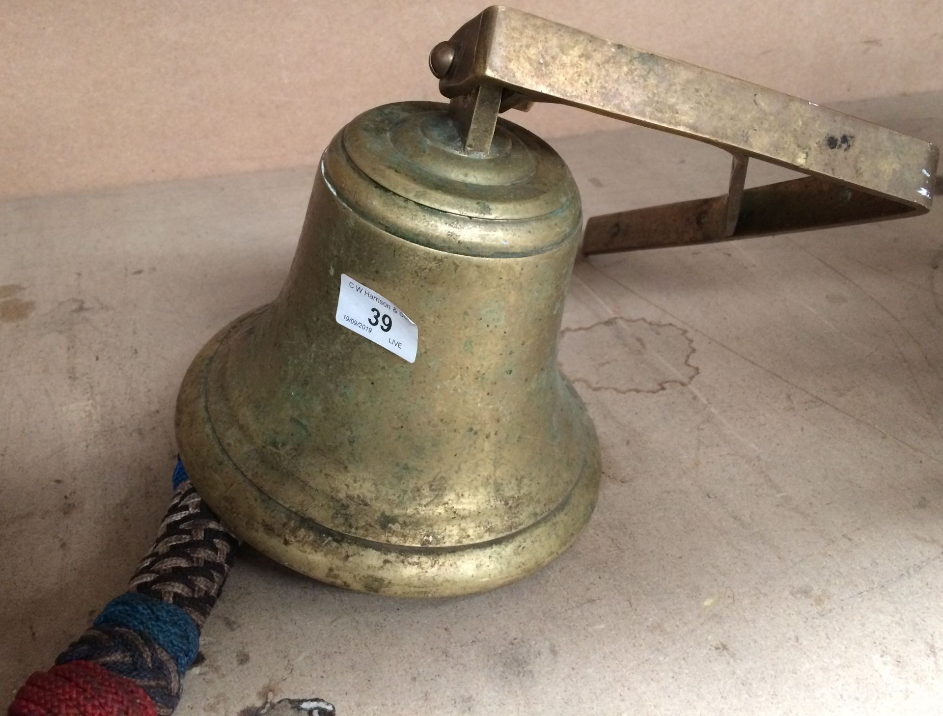 A brass bell - 20cm high,