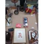 Contents to tray - carved wood tribal head, a Wye pottery Madonna and child, desk, pen set,