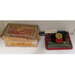 A Mettype Junior working tin toy typewriter with original box