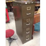 An Art Metal London green metal quarto four drawer filing cabinet
