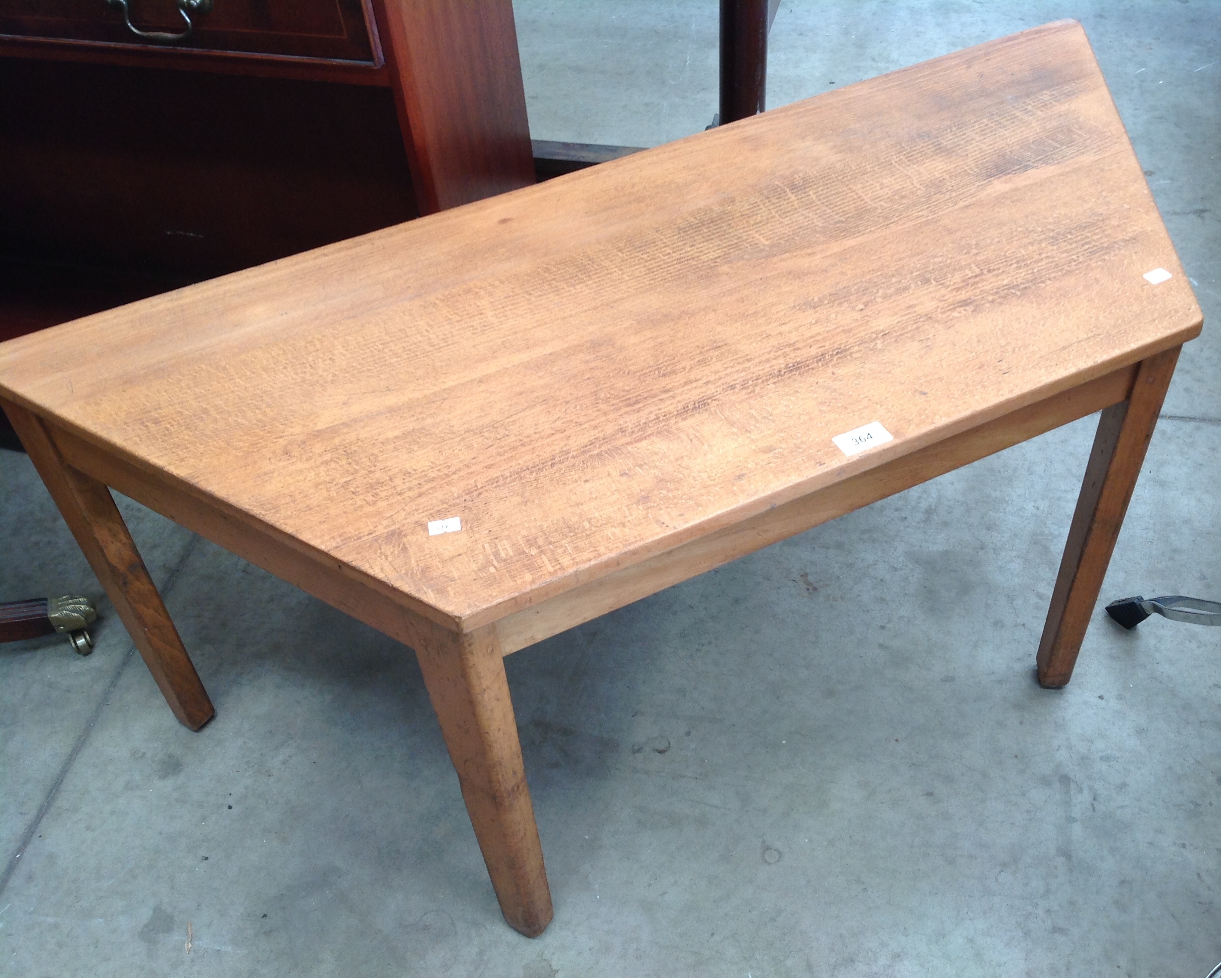 An Esavian British oak framed four sided low table 112cm max