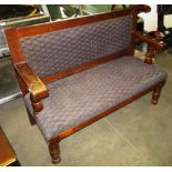 Oak settee with low back and matching upholstery to lot 387 - 134cm long