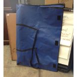 A folding wallpaper table, blue PVC bag containing an 'A' frame marker board pad stand,