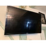 A Samsung model UE46D 5000 PWXXU 46" wall mounting TV complete with remote control and wall bracket