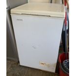 A Nova Scotia small lift top chest freezer