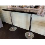 Black granite high bar table on twin chrome supports 137 x 37cm